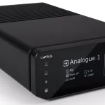 Front view of the Cyrus 40 PPA phono preamplifier featuring a brushed aluminum chassis and glass front display, with input/output controls and sleek hi-fi styling