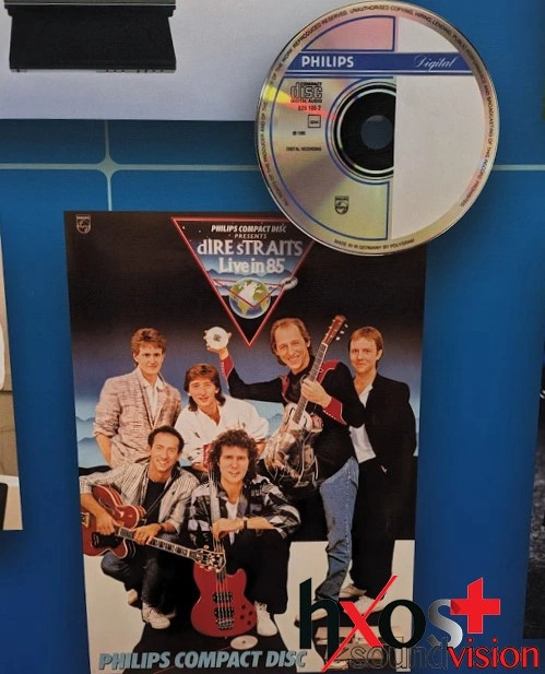 Το εξώφυλλο του άλμπουμ "Brothers in Arms" των Dire Straits, με την εμβληματική κιθάρα στον γαλάζιο ουρανό.